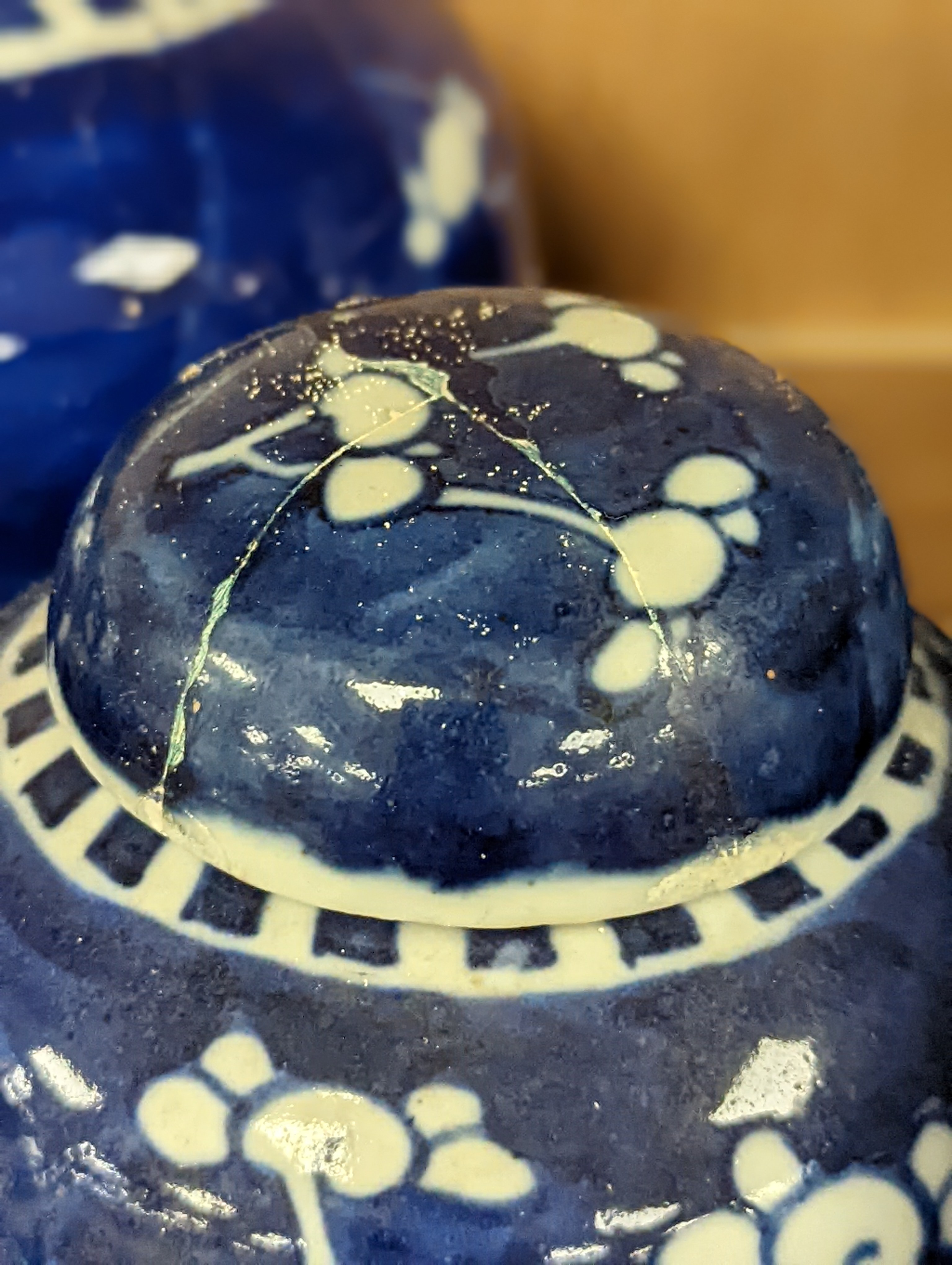 A pair of Chinese blue and white vases and eleven jars, six with covers., Vase and matching cover 28 cms high.